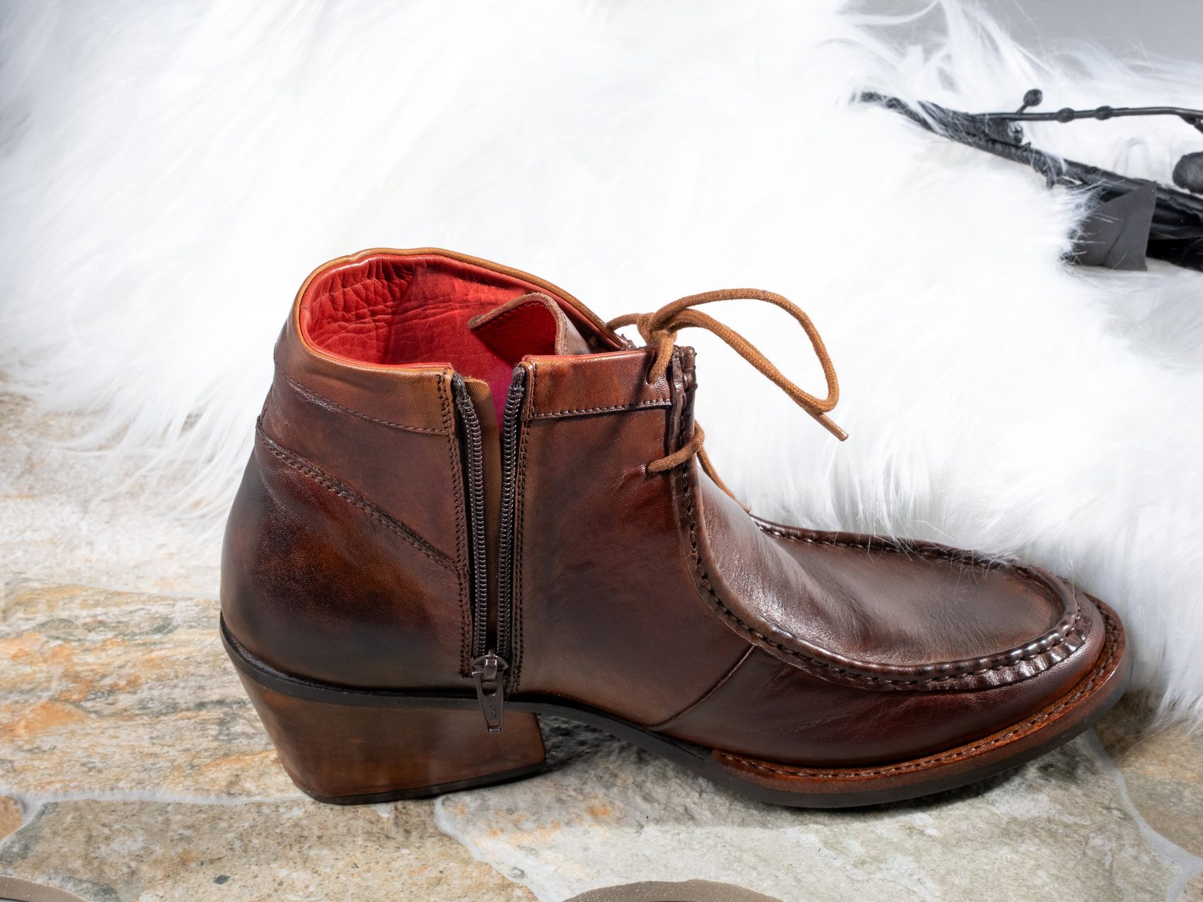 The cherry-red soft-leather lining of the Florence