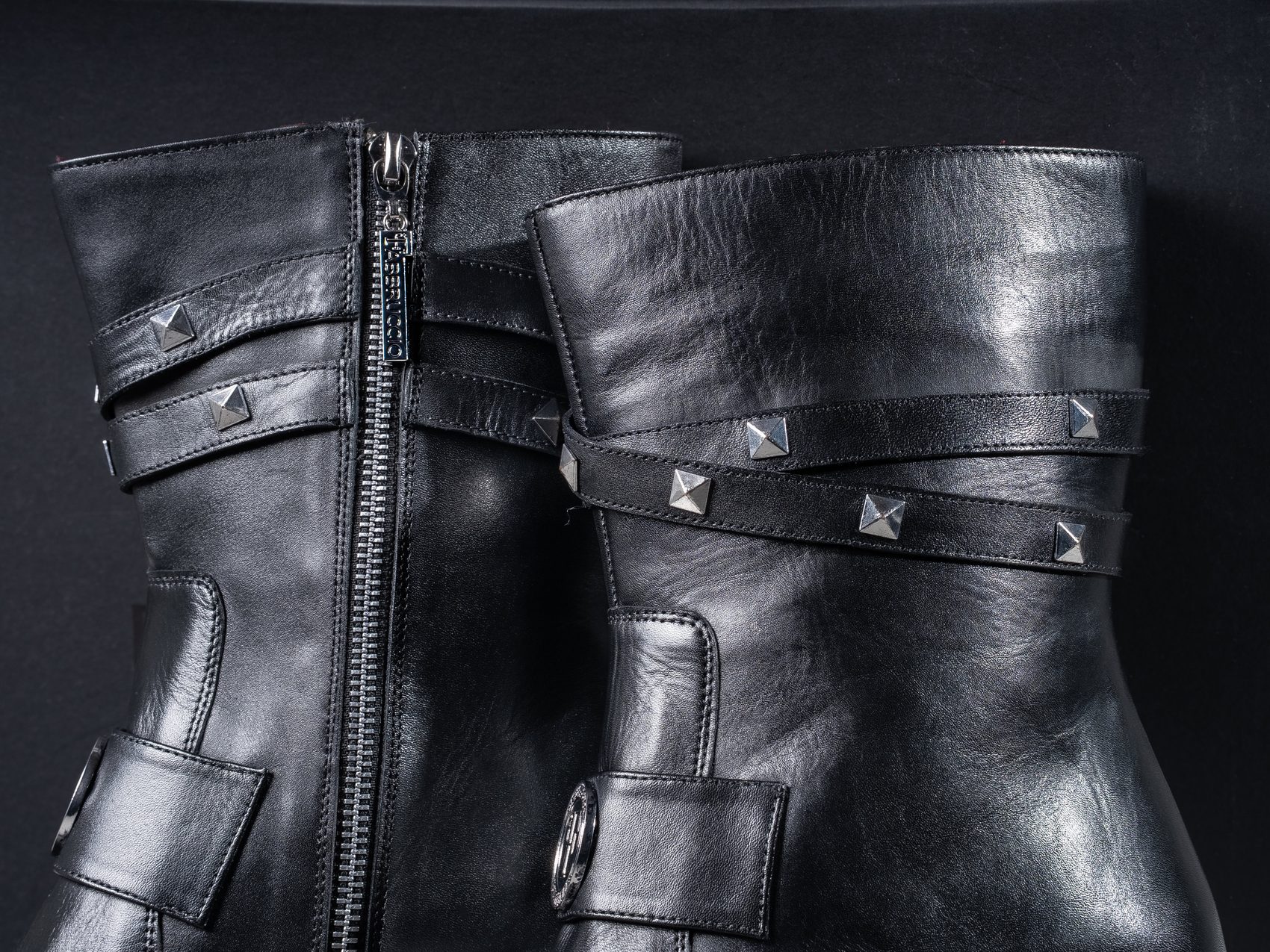 The twin studded straps and side zip of the Paris in black