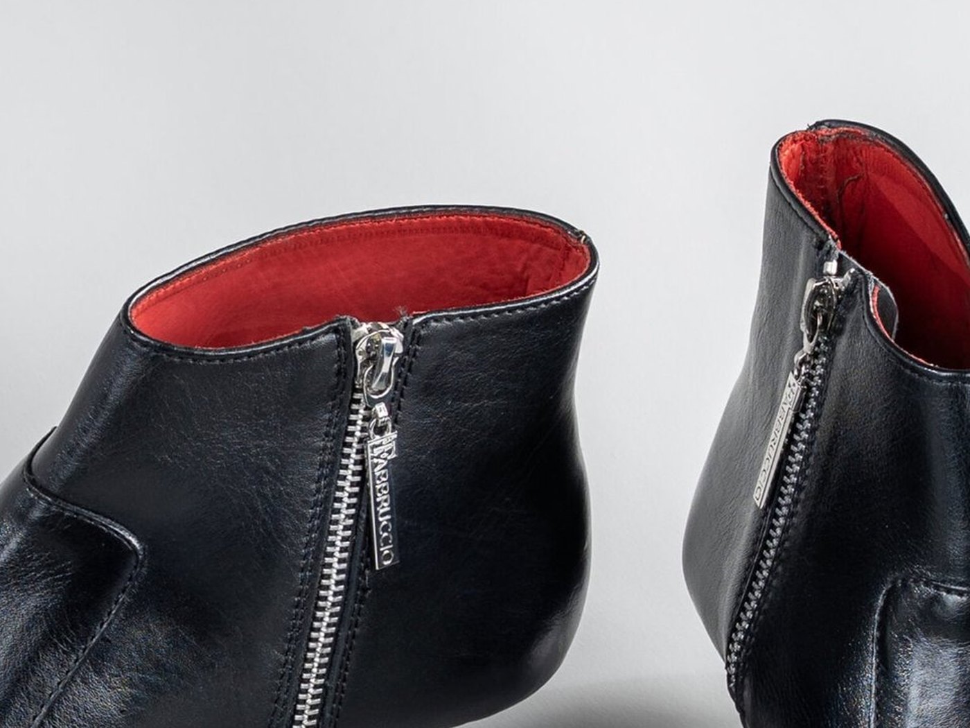 The cherry-red soft-leather lining inside the Grace