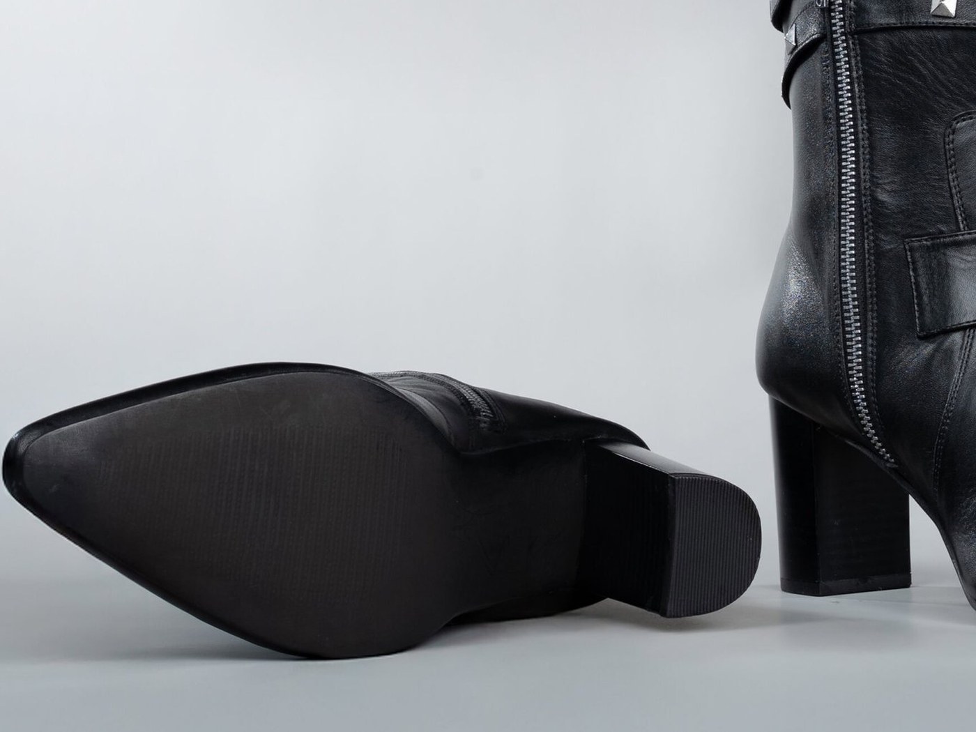 The rubber outsole and block heel of the Paris in black