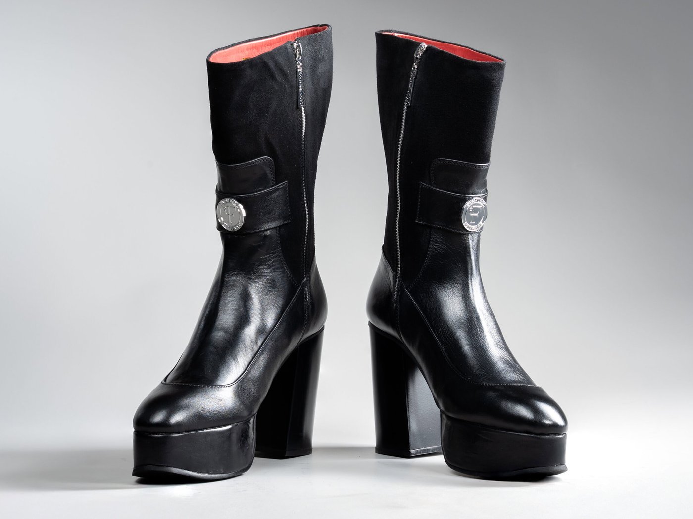 The Valentina, front view, both boots and the cherry-red lining at the collar